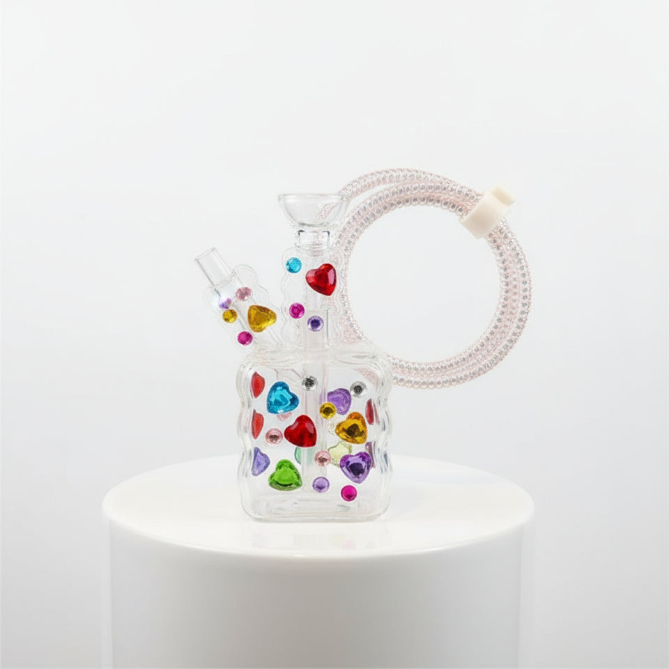 Decorative phone charger with colorful gemstones on a white background