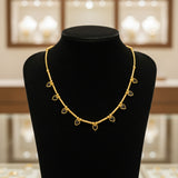 Gold bracelet with heart-shaped charms