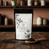 Muggmates Mystic Brew package on a wooden surface with coffee beans and a scoop.