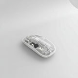 Transparent wireless mouse with text on a blue background